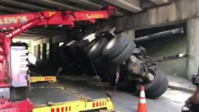 VIDEO: Truck crashes into Interstate 93 overpass in Methuen